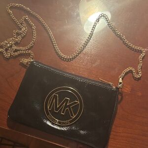 Michael Kors Black Wristlet with Gold Chain